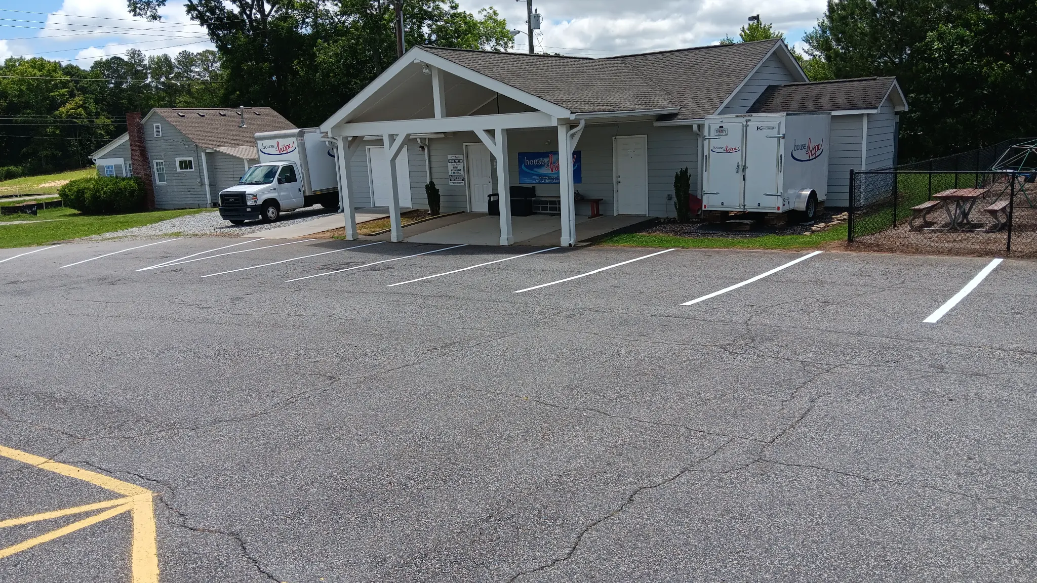 Fresh white parking lot striping at a North & Middle Georgia commercial property.